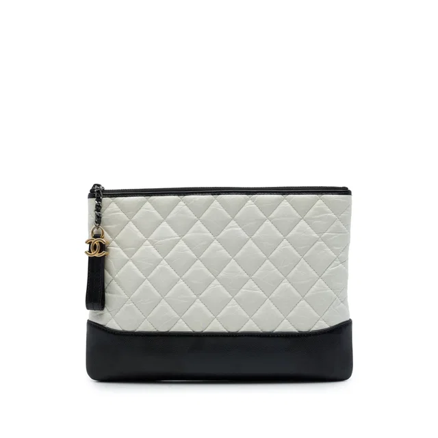 Black Chanel Medium Bicolor Quilted Aged Calfskin Gabrielle O Case Clutch in Black Calfskin from Designer Revival