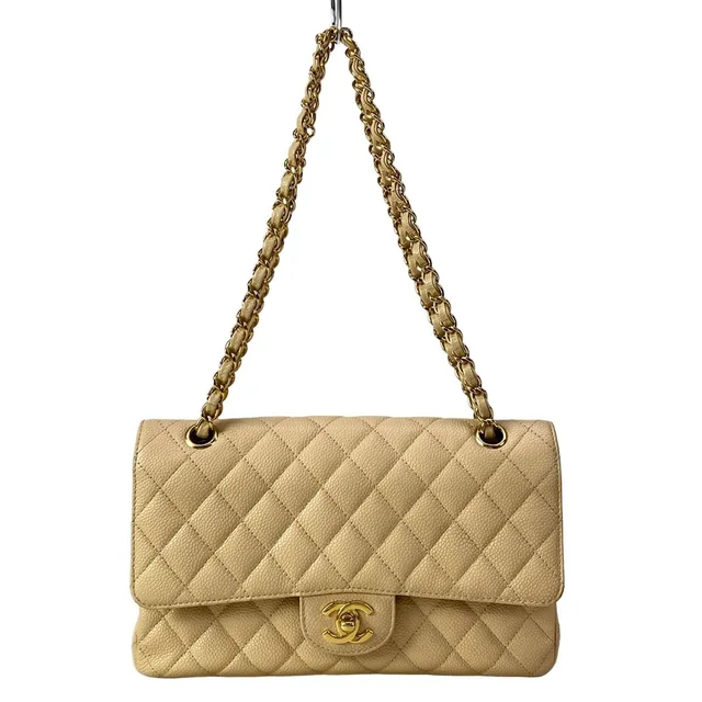 Chanel Shoulder Bag Double Flap Quilted Beige Chain Gold in Beige Caviar leather from The Reluxe
