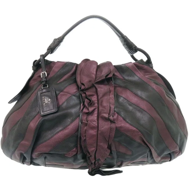 Prada Vitellino Mordo Leather Purple Black Handbag in Black Leather from The Reluxe