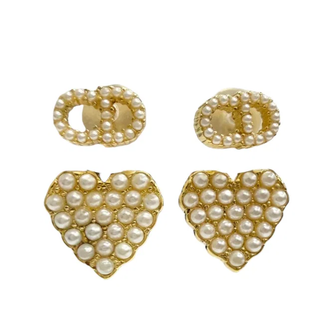 Gold Dior Gold Plated Faux Pearl CD Logo Heart Drop Bullet Back Earrings in Gold from Designer Revival, photo 1 of 1