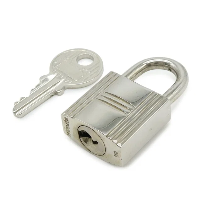 Hermès Cadena Padlock Key with Metal Silver in Silver from The Reluxe