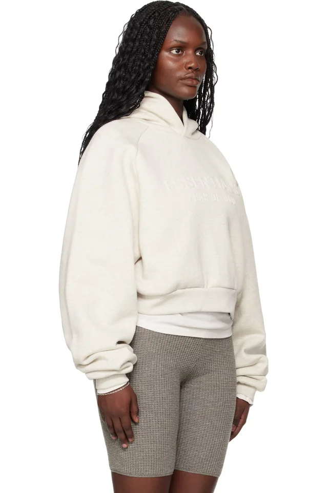Fear of God ESSENTIALS Gray Holiday Embossed 90s Raglan Hoodie, photo 2 of 4 from SSENSE