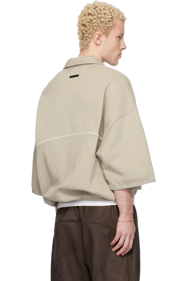 Fear of God ESSENTIALS Taupe Active Trace 3/4 Sleeve Modern Polo, photo 3 of 4 from SSENSE