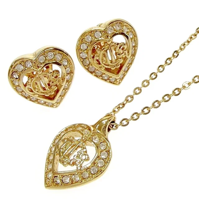 Dior Rhinestone Emblem Heart Necklace Earrings from The Reluxe