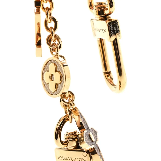 Louis Vuitton Brass Enamel Fleur De Monogram Bag Charm Chain Gold in Gold from FASHIONPHILE, photo 4 of 5