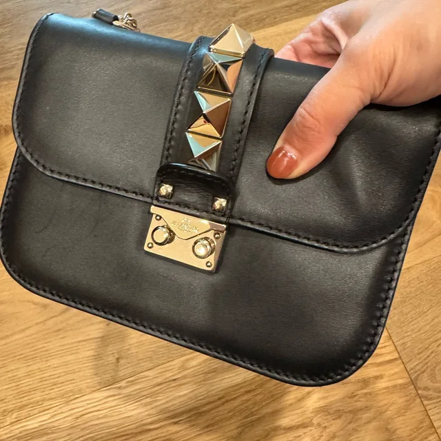 Valentino Garavani Black Clutch in silver|black|gray from Poshmark, photo 1 of 1