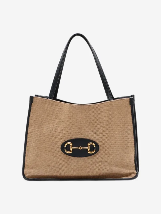 Gucci Neutral and navy Horsebit 1955 canvas & leather tote bag in Navy Canvas from Sign of the Times