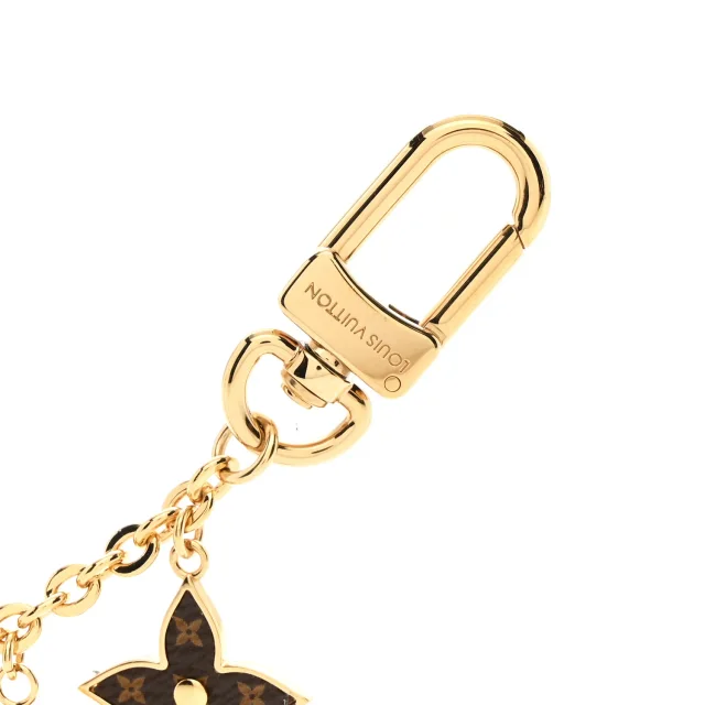 Louis Vuitton Brass Enamel Fleur De Monogram Bag Charm Chain Gold in Gold from FASHIONPHILE, photo 3 of 5