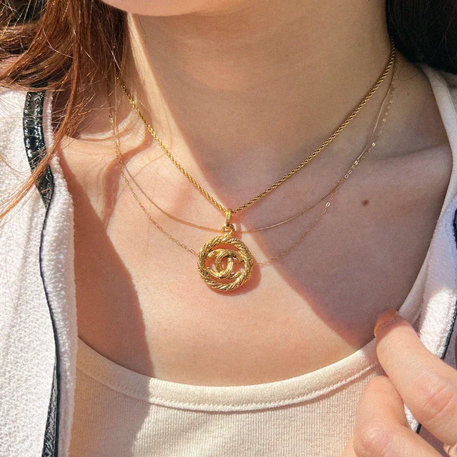 Chanel Round Cutout CC Mark Necklace Gold in Gold from VINTAGE QOO TOKYO