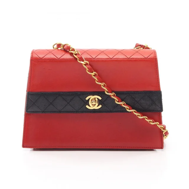 Chanel Shoulder Bag Quilted Red Navy Lambskin Bicolor Chain in Red Lambskin from The Reluxe