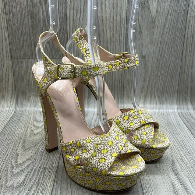 REDValentino Yellow Daisy Platform Sandals in yellow|red from Poshmark