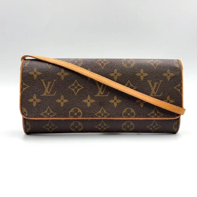 Louis Vuitton Pochette Twin GM Monogram Leather Brown Shoulder Bag Gold in Brown Leather from The Reluxe