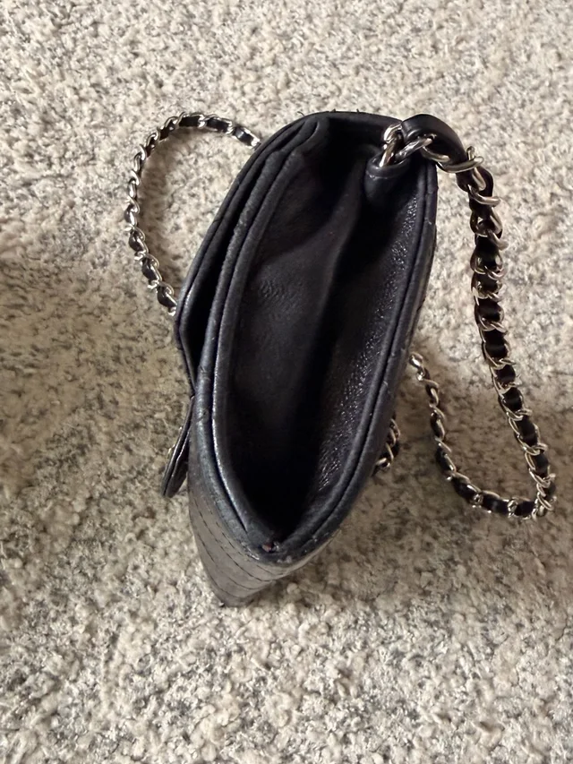 Chanel Quilted Lambskin Mini Wallet-On-Chain With Silver Hardware in black Lambskin from Poshmark, photo 6 of 15