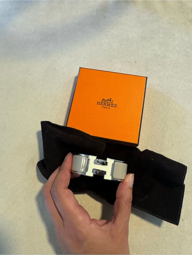 Hermès Herms Clic Clac H Bracelet In Marron Glac With White H in silver|gray from Poshmark, photo 1 of 1