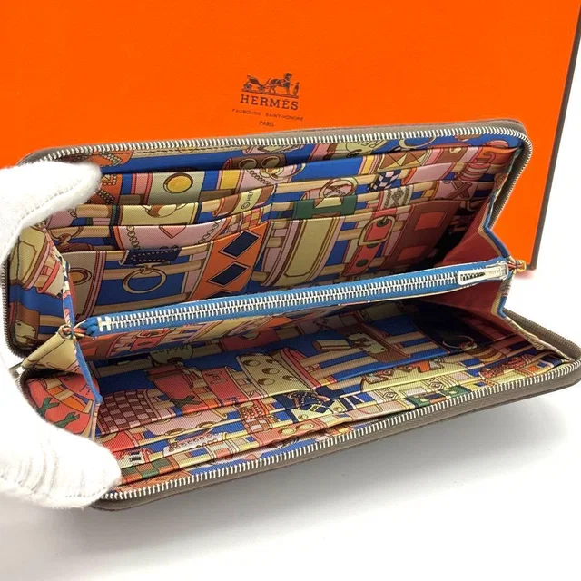 Hermès Wallet Azap Long Silk'in Etoupe Greige in Taupe Silk from The Reluxe