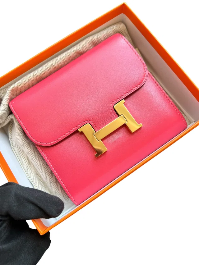 Hermès Kelly Compact Wallet Rouge Vif Tadelakt GHW in Red from Luxury Promise