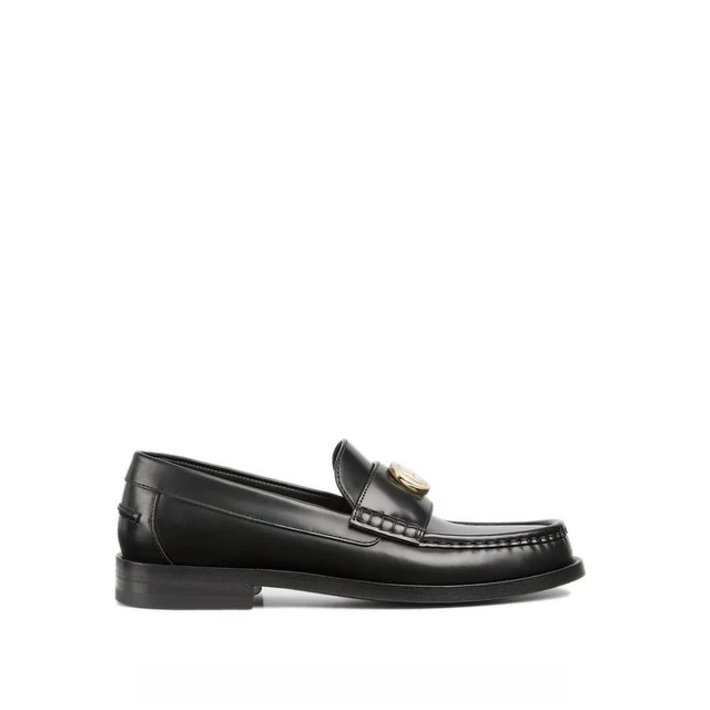 Gucci Black Leather Slip-On Loafers from HEWI