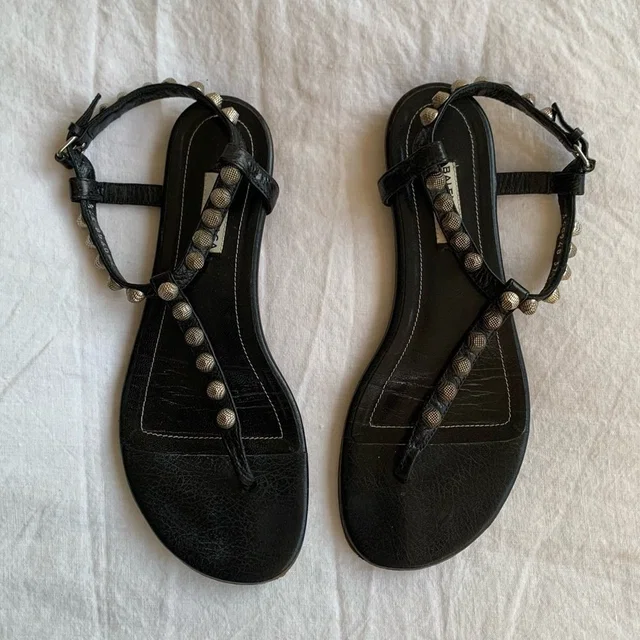 Balenciaga Vintage Arena Silver Stud Leather Thong T Sandals Black in black Leather from Poshmark, photo 1 of 1