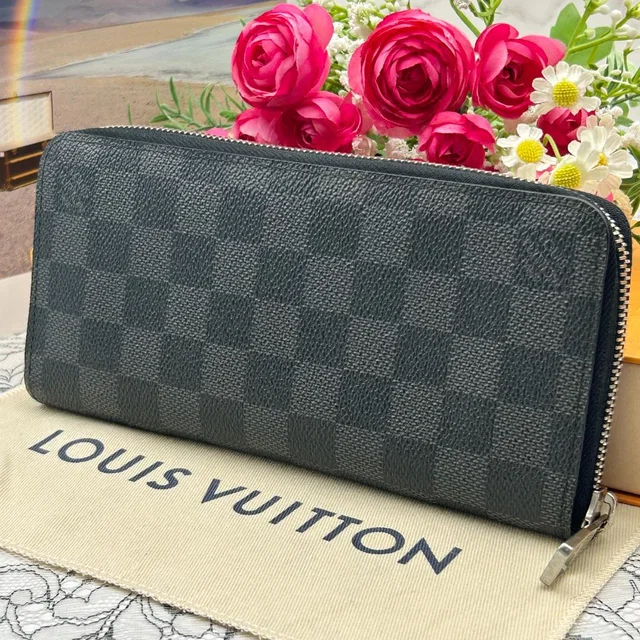 Louis Vuitton Damier Graphite Vertical Zippy Wallet in Grey from The Reluxe