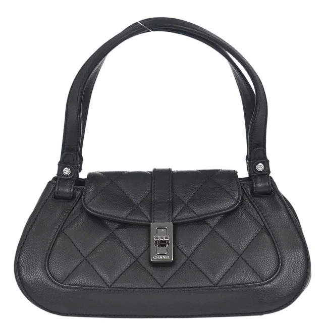 Chanel 2005-2006 Black Caviar Skin Mademoiselle Lock Handbag in Black Caviar leather from AMORE Vintage Tokyo