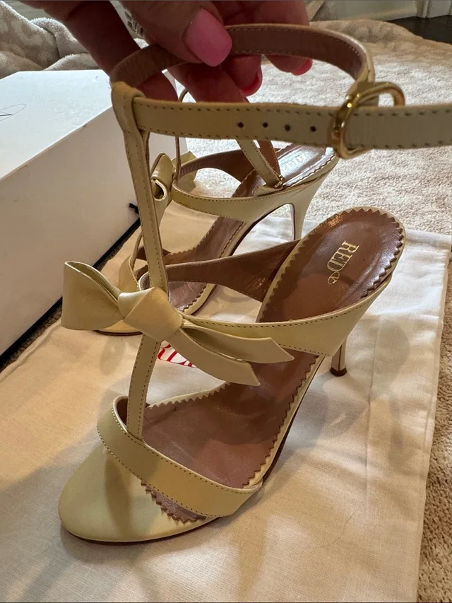 REDValentino Women's Cream T-Strap Bow High Heel Sandals in White from Poshmark