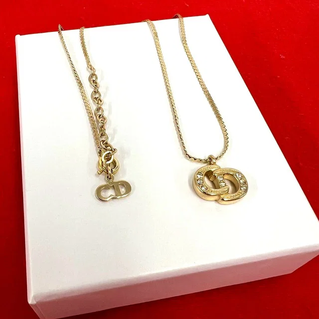 Dior CD Logo Pendant Gold in Gold from The Reluxe