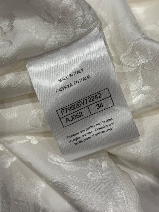Chanel ) White Fabric with floral jacquard pattern Tops in White from HEWI