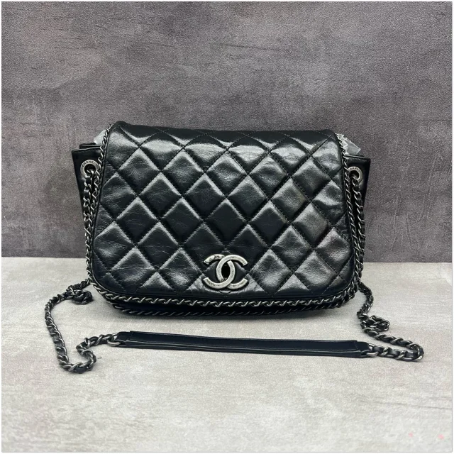 Chanel Black Aged Calfskin Quilted Around Flap Bag in Black Calfskin from Luxury Promise