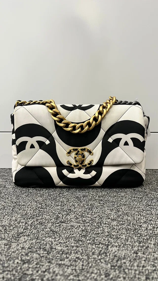 Chanel 19 Matelasse Canvas×Leather White×Black Gold/SV in Black Canvas from Luxury Promise