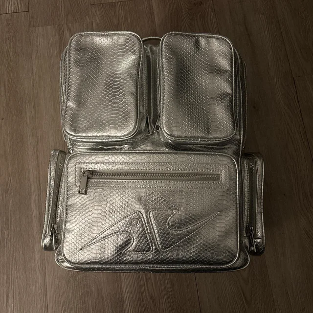 Balenciaga Men's Backpacks - Silver/Gold in gold|silver|gray from Depop, photo 1 of 1
