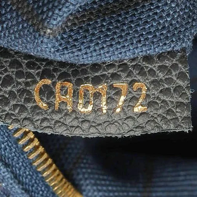 Louis Vuitton Monogram Empreinte Artsy MM Bag in Leather from A Retro Tale, photo 9 of 10