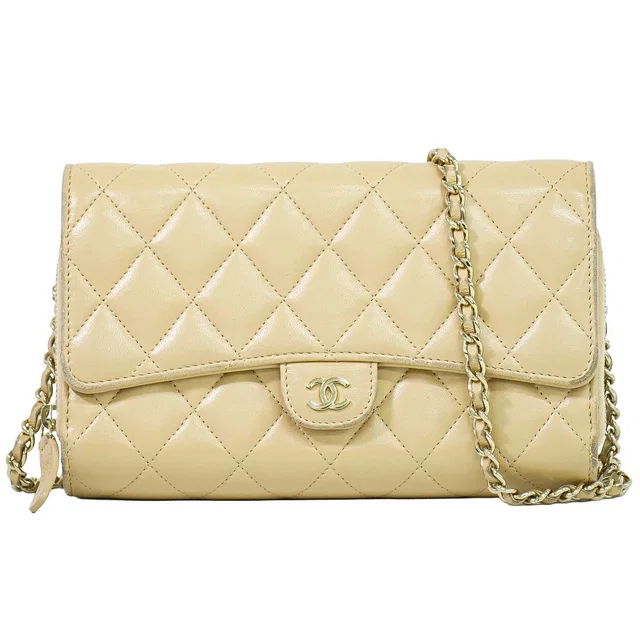Chanel CC Logo Quilted Chain Wallet on Pochette Lambskin Leather Beige Shoulder in Beige Lambskin from The Reluxe