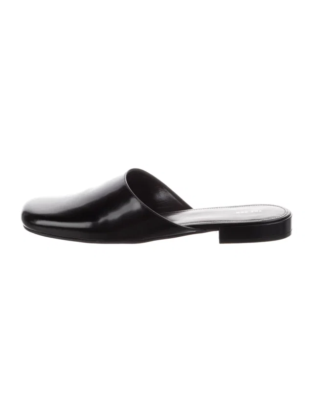 The Row Penelope Flat Mule Leather Mules in black Leather from The RealReal