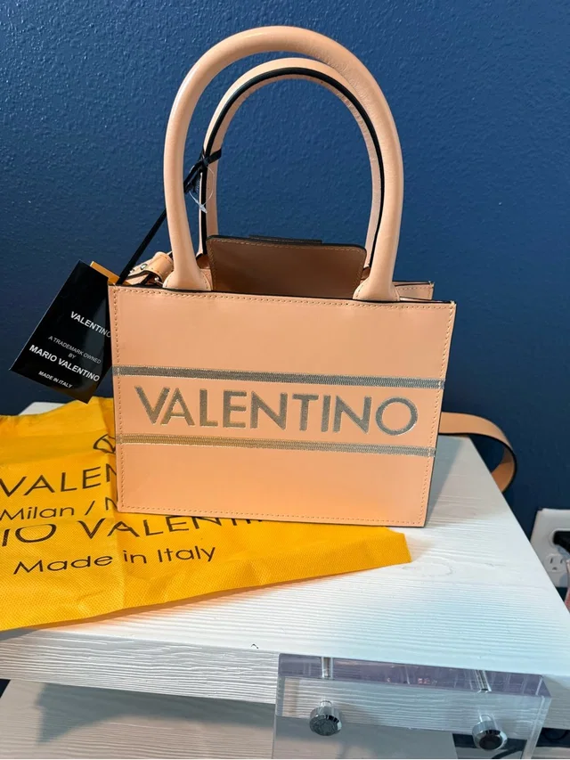 Valentino Garavani Peach Logo-Stripe Leather Shoulder Bag in red Leather from Poshmark