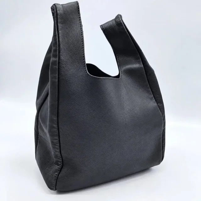 Comme des Garçons Bag Leather Hand Bag in black Leather from Grailed
