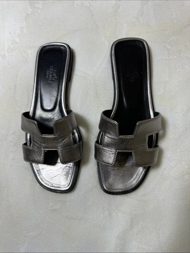 Hermès Oran Slides in silver|gray from Poshmark