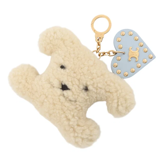 Celine Triomphe Pom Bag Charm Natural/Pale Blue49J663GVS.02VP Shearling Leather in Beige Leather from GALLERY RARE
