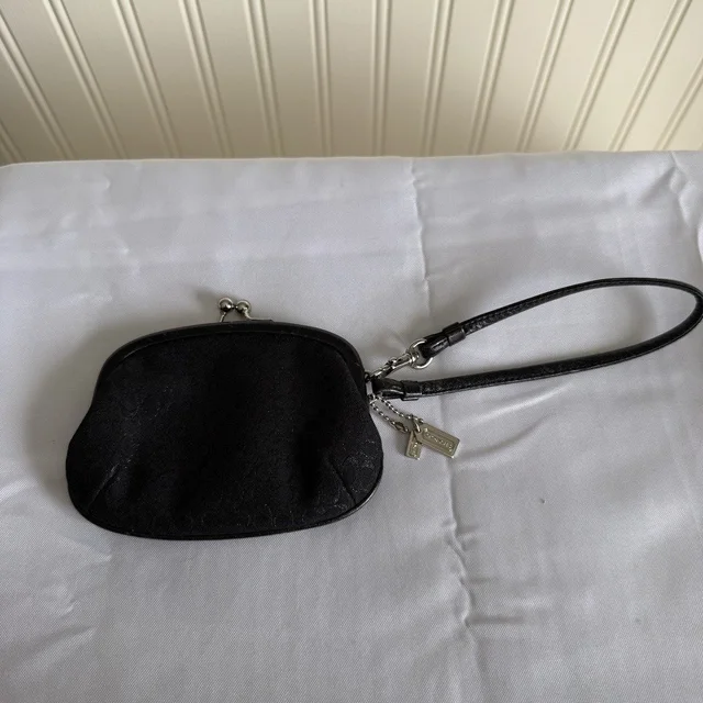 Coach Vintage Black And Silver Kiss Lock Wristlet Coin Purse/ Mini Purse in black Leather from Poshmark, photo 1 of 1