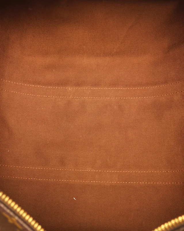 Louis Vuitton Monogram Keepall Bandoulière 60 Weekend Bag in Coated canvas from A Retro Tale, photo 9 of 10