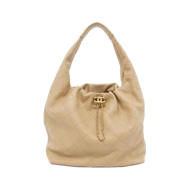 Chanel Shoulder Bag Beige in Beige Togo leather from The Reluxe