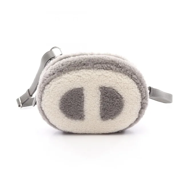 Hermès Waist Bag In The Loop Ecru Grimaire Shearling in Swift leather from The Reluxe