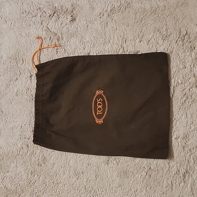 Tod's Storage Bag in brown|red from Poshmark
