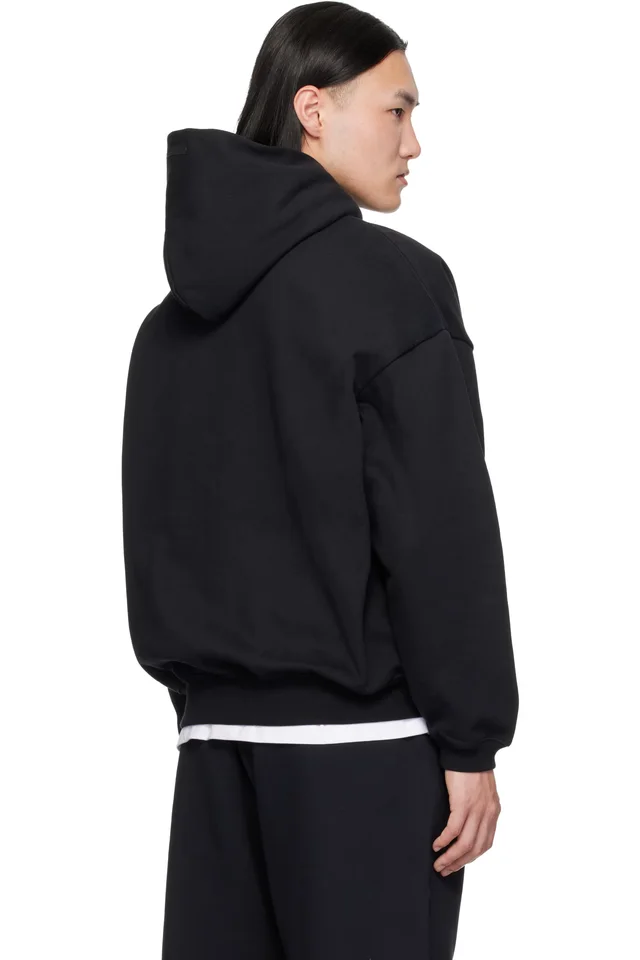 Fear of God ESSENTIALS Black Varsity 90s Hoodie, photo 3 of 4 from SSENSE