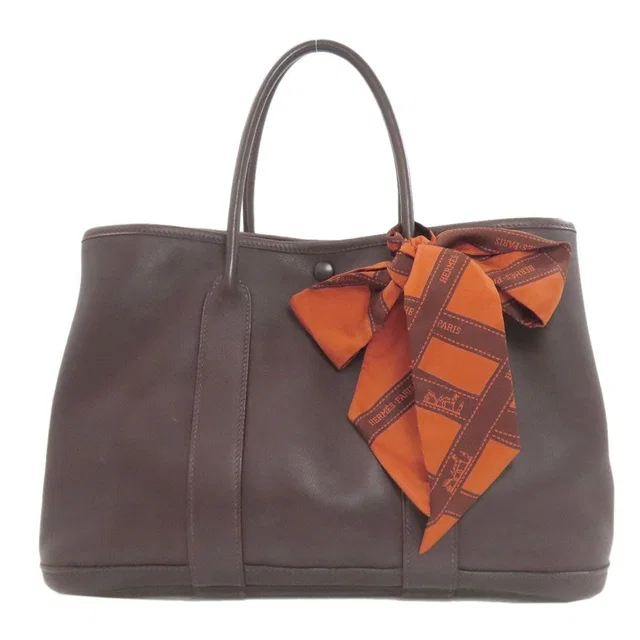 Hermès Garden Twirl TPM Havana Handbag Swift in Swift leather from The Reluxe