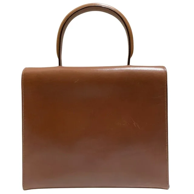 Celine Leather Handbag in Gold Leather from LuxUness, photo 2 of 9