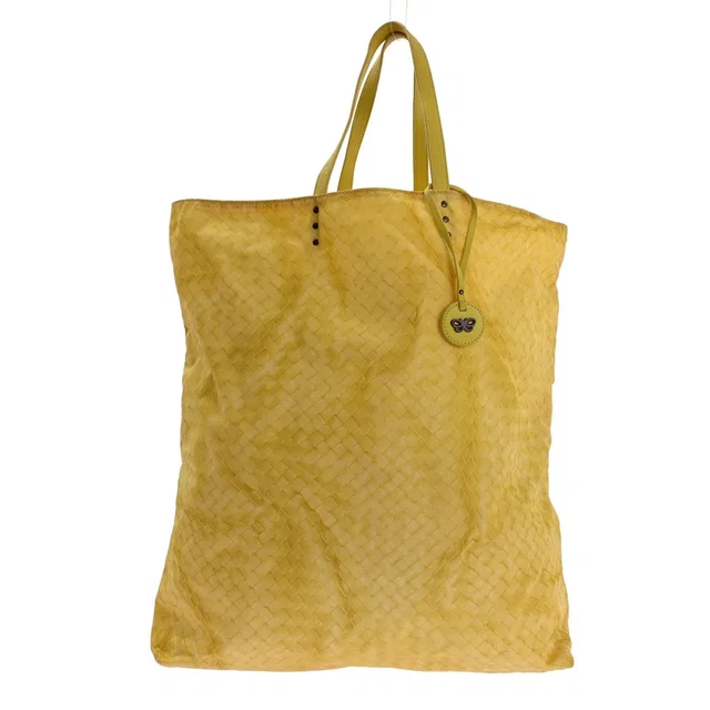 Bottega Veneta Intrecciato Print Tote Bag Yellow in Yellow Woven leather from The Reluxe