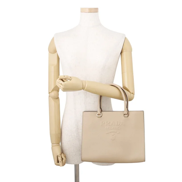 Prada Embossed Logo 2-Way Bag Beige1BA337 Leather in Leather from GALLERY RARE, photo 2 of 2