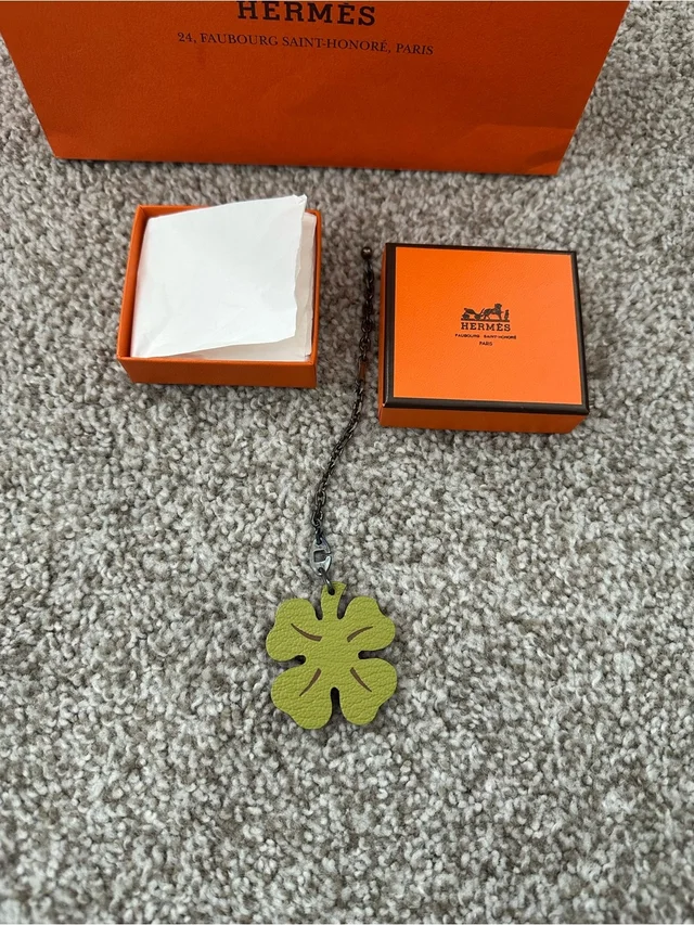 Hermès Orange Leather Clover Pendant Charm. Authentic in orange|brown|red Leather from Poshmark, photo 5 of 7