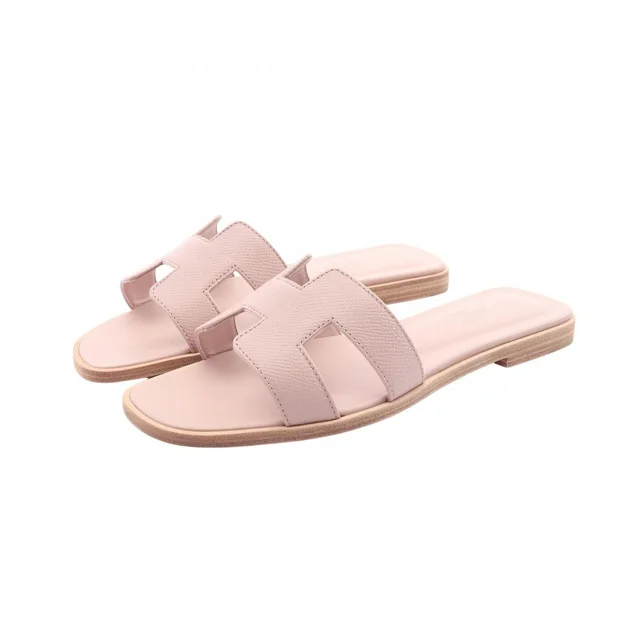 Hermès Mules Oran Rosepol Nu Leather Sandals in Leather from The Reluxe