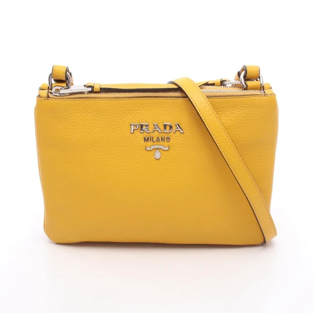Prada Shoulder Bag Metal Logo Yellow Leather in Yellow Leather from The Reluxe